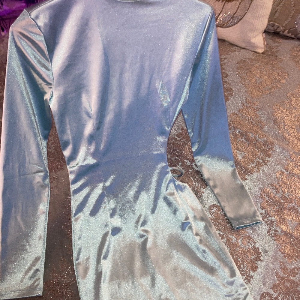 Shimmery, light blue/sea greenish colored dress with a side cut out.